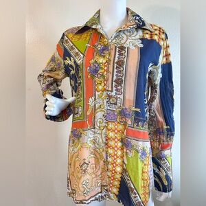 Vibrant Patchwork Blouse with Floral Accents